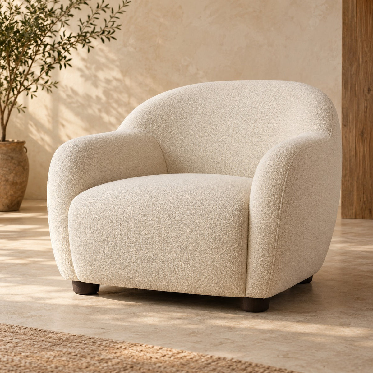 Cream rounded lounge chair — view 1